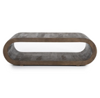 Dark wood Elora coffee table with a rounded capsule design, hollow center, and subtle wood grain texture.