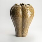 Sculptural ceramic vase with a mottled brown, gold, and blue glaze and a ruffled rim.