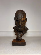 Rustic bronze bust sculpture with textured finish, ideal for modern home decor and interior storytelling.