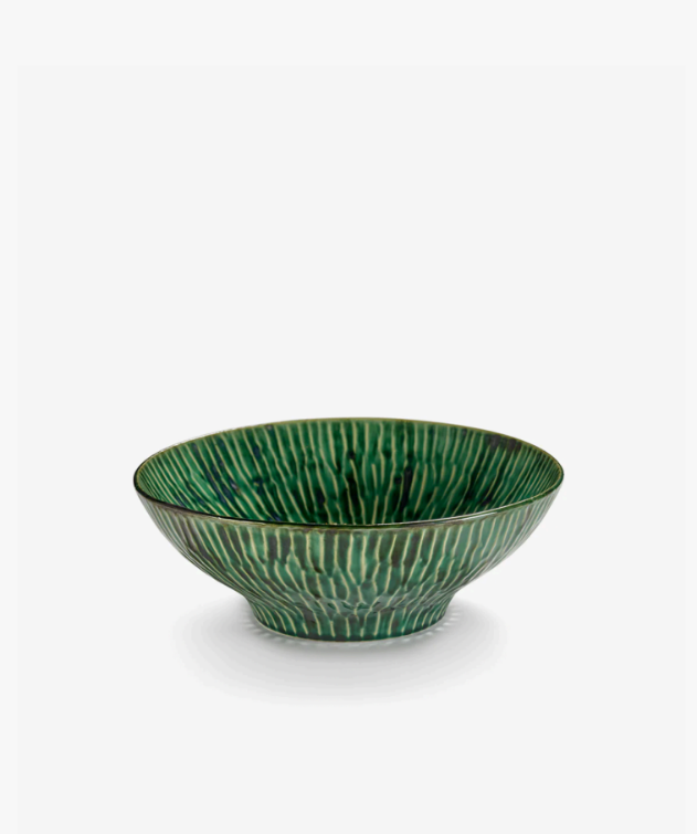 Green ceramic Lanza salad bowl with vertical ridged texture and dark green glaze, casting a slight shadow.