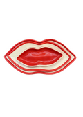 Set of three nested red and cream lip-shaped dishes with a glossy finish.