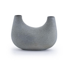 Small gray textured vase with a unique U-shape and two openings.