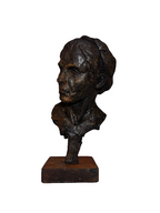 Orpheus bust sculpture in dark brown, textured iron with a distressed finish, viewed in side profile on a brown dark base.