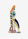 Colorful decorative ceramic vase with stylized fish design, featuring an orange crest, blue eye, and geometric patterns in primary colors.
