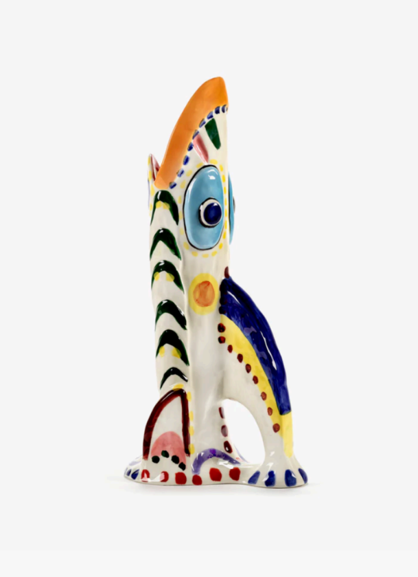 Colorful decorative ceramic vase with stylized fish design, featuring an orange crest, blue eye, and geometric patterns in primary colors.