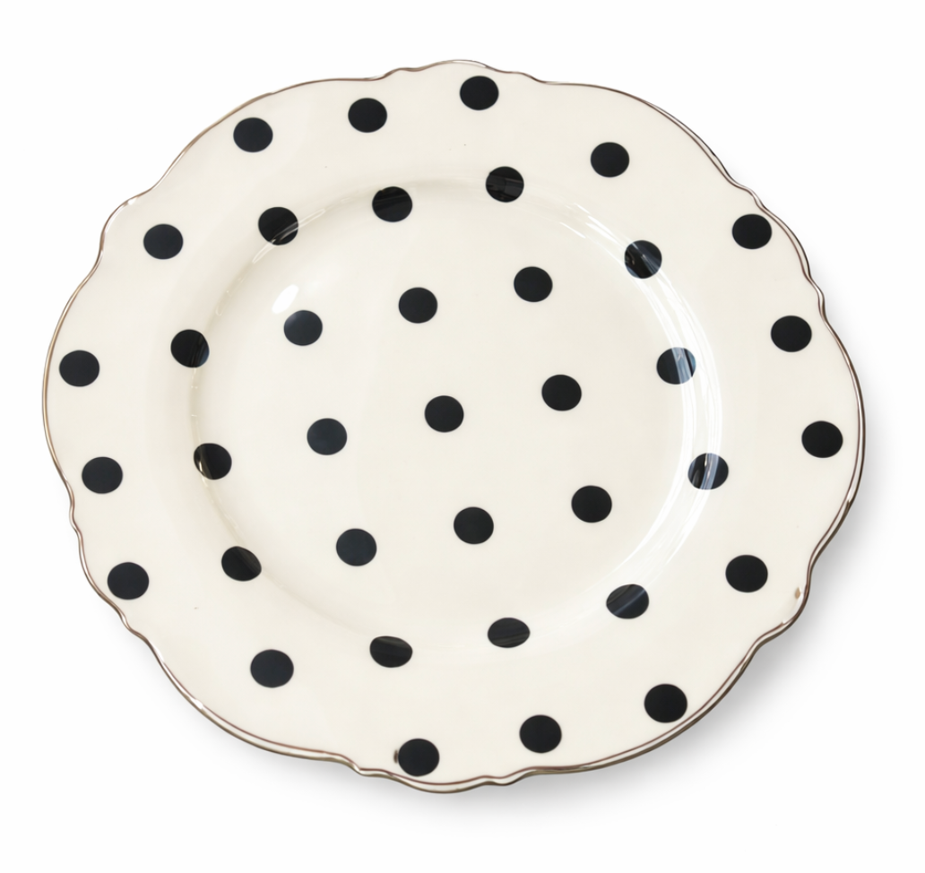 Dame Layered Tea Cup Set saucer, white with black polka dots and a scalloped gold rim.
