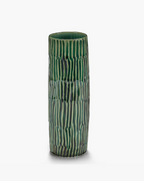 Green cylindrical vase with textured vertical ridges and a glossy finish.