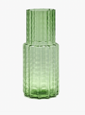 Two-tiered green glass vase with a vertical waves pattern.