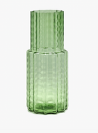 Two-tiered green glass vase with a vertical waves pattern.