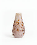 Quartz vase by Object and Story, decorated with applied clear and brown glass fragments.