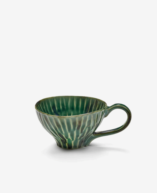 Green cappuccino cup by Verde Lanza with a ribbed texture and glossy finish, featuring a side handle.