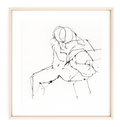 Abstract painting of embracing figures with black ink lines and splatters, set in a light wood frame.