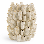 White ceramic Borja vase by Object and Story with protruding tubes and a mottled surface.
