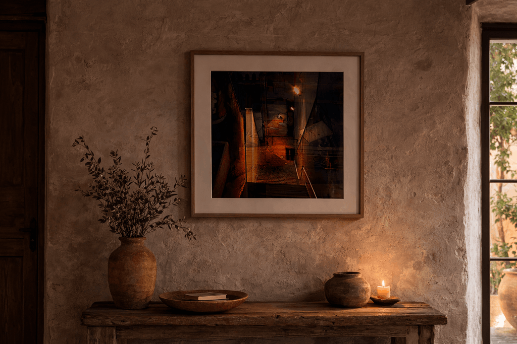 Escala Painting by Manuel Cohen, framed, depicting a dark, atmospheric urban stairway scene lit by warm lights.