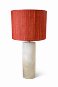 Red textured fabric table lamp with a cylindrical marbled stone base.