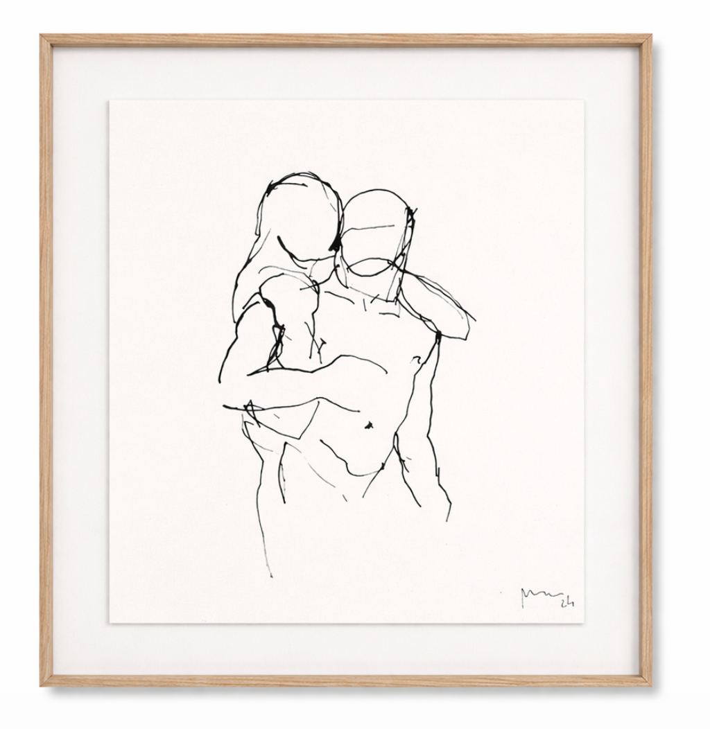 Black and white minimalist line drawing of two embracing figures, in a light wood frame.