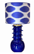 Provet Hanging lamp with a glossy cobalt blue ceramic spiked base and a blue and white ikat fabric shade.