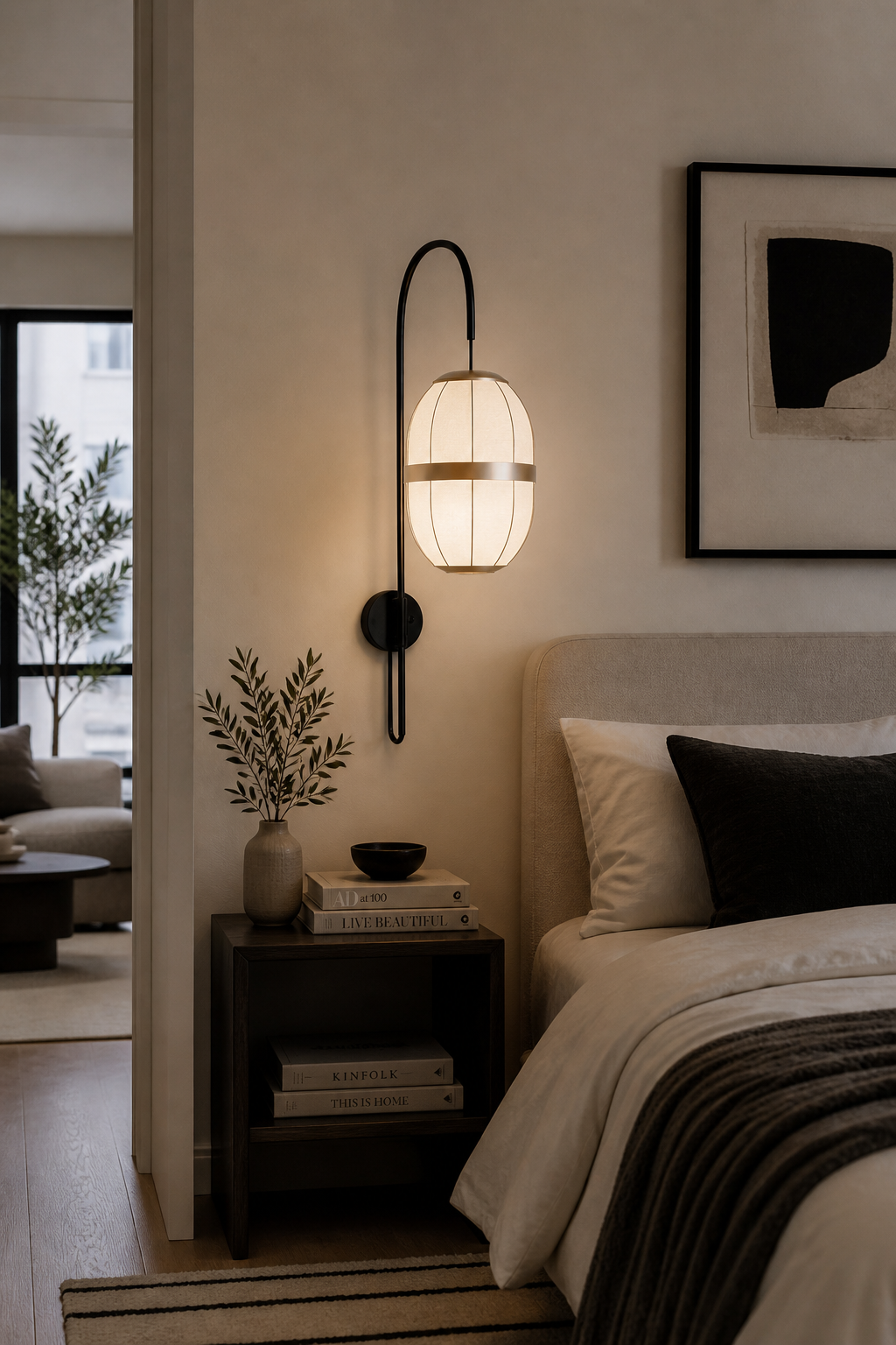 Pull Wall Lamp with a black arched frame and an oval cream fabric shade with gold bands, illuminating a modern bedroom.