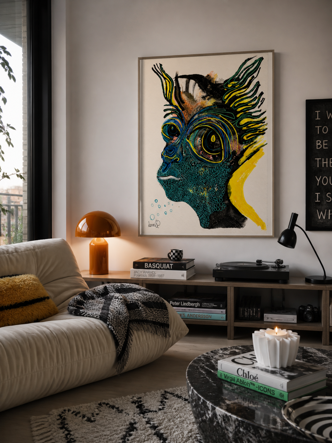 Framed artwork displaying an abstract blue and yellow creature profile with intricate textured patterns.